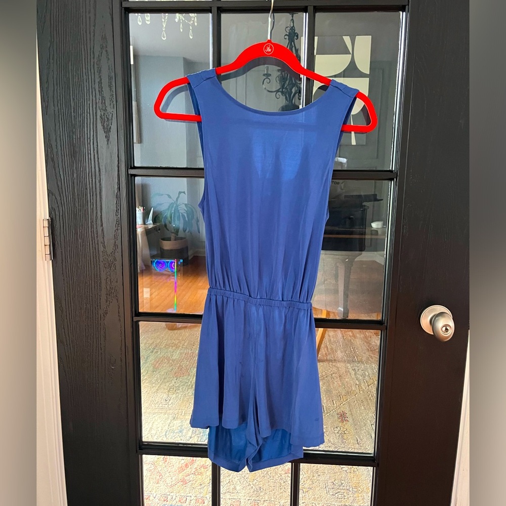 Silent + Noise Blue short Jumper with open back. Size Small.